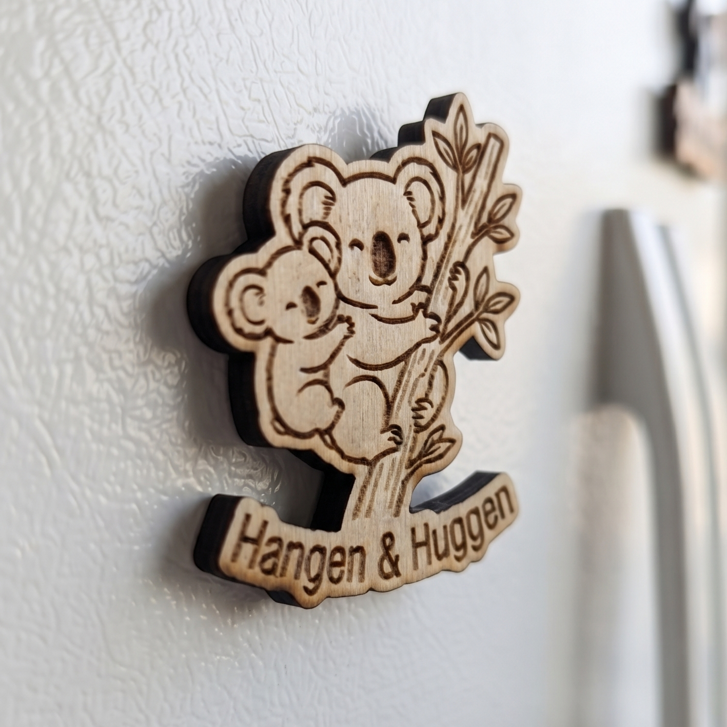 Koelkastmagneet Hangen en Huggen